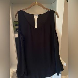 Chicos size 2.  Sleeveless black dot top.  Lined underneath with a light sheath